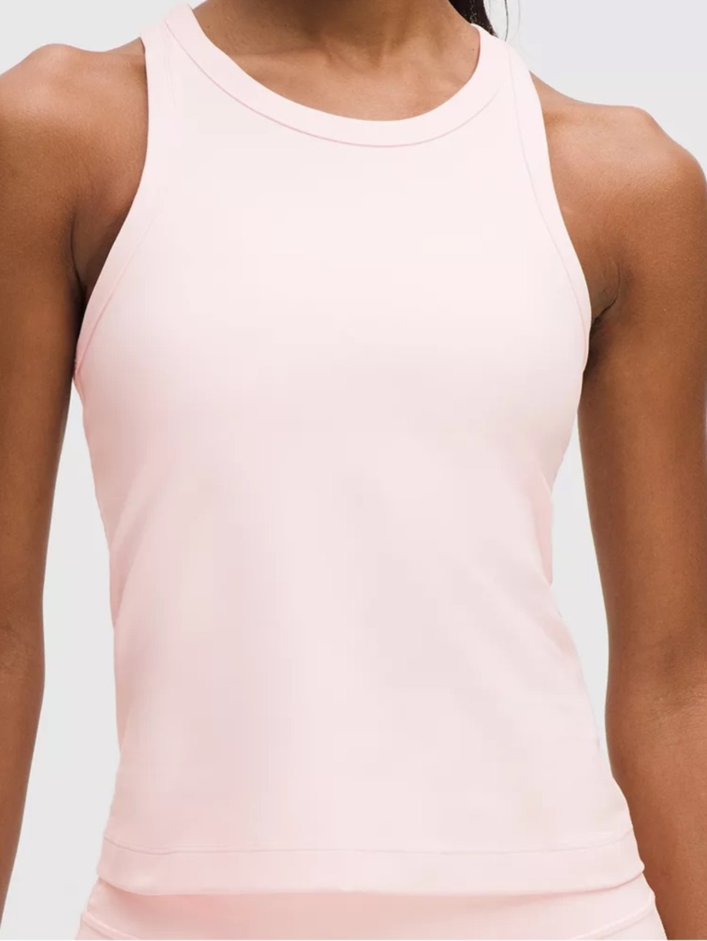 Light pink lululemon tank top (not the same as in the first pic, very similar)